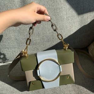 Yuzefi Cross Body bag